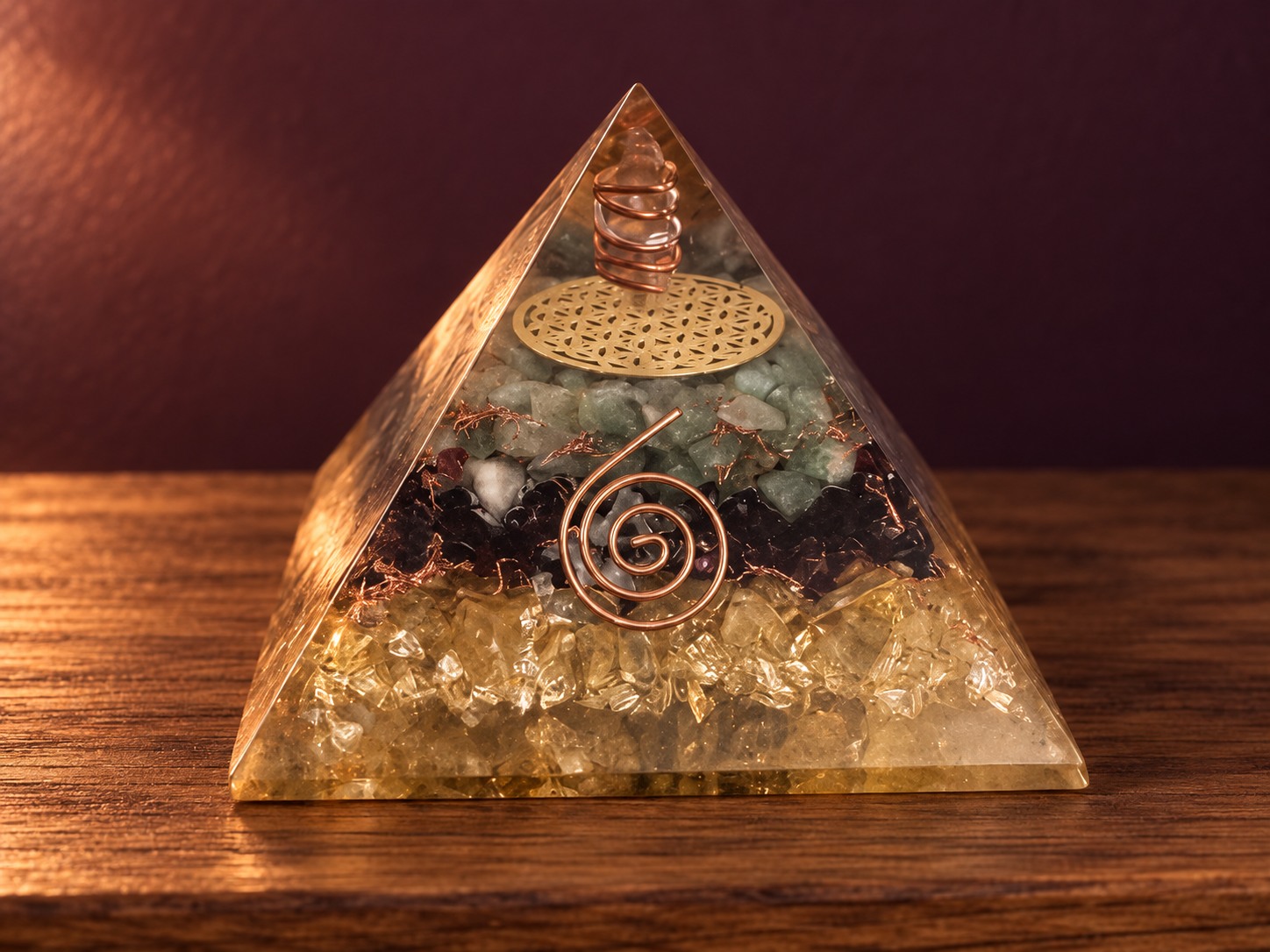 A softly styled close-up of my crystal pyramid on its wooden shelf